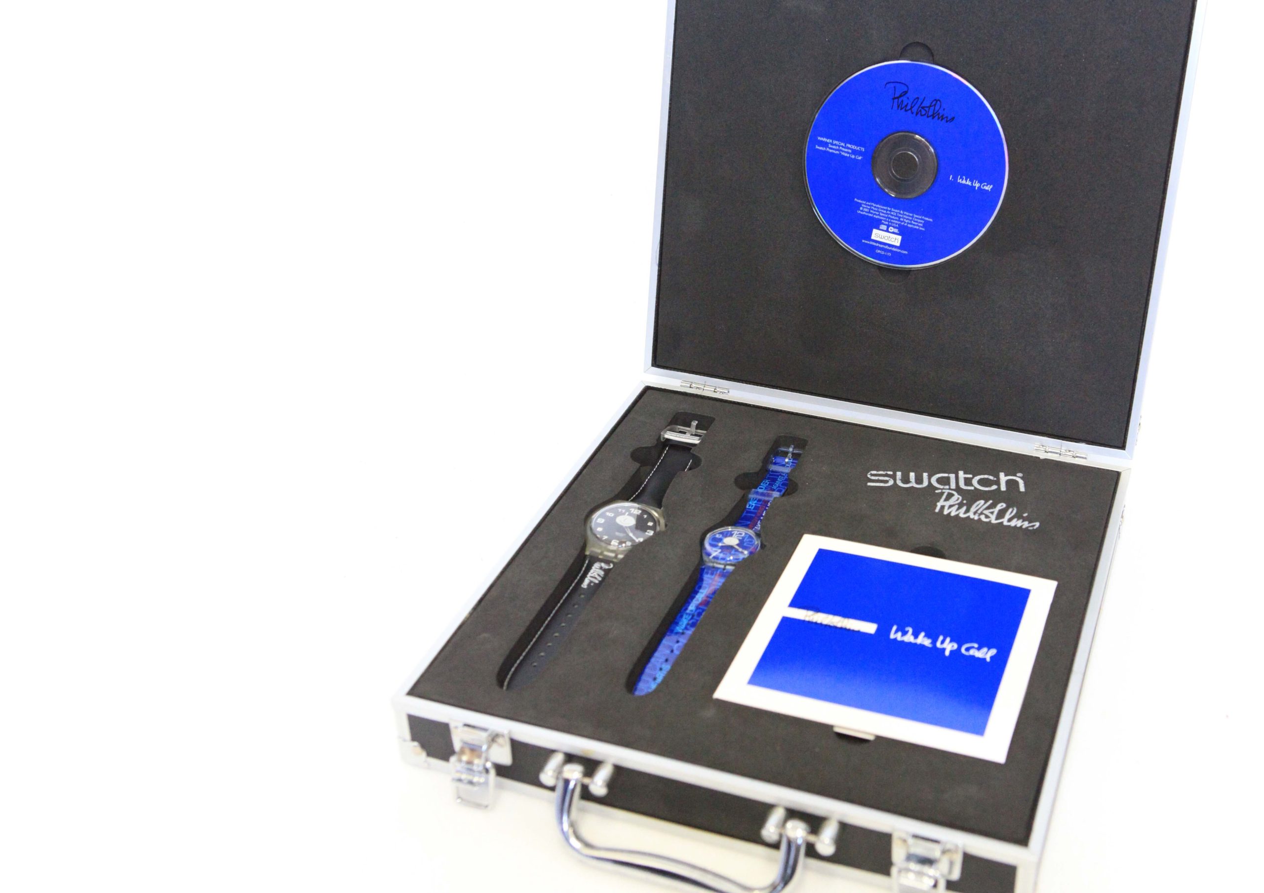 Hi end luxury display case with music memorabilia of Phil Collins. Product protection and display for CD, watch and brochure